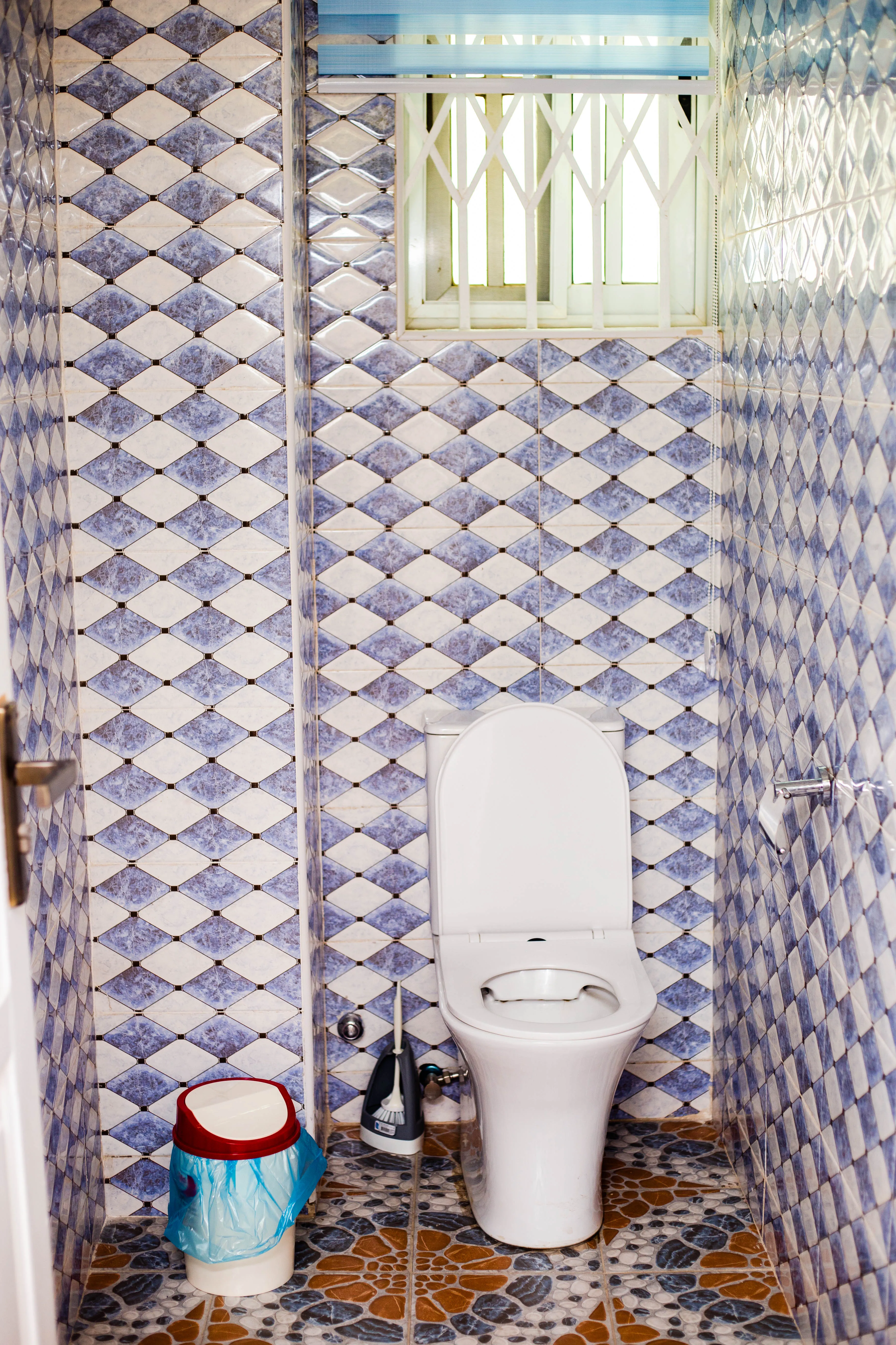 Tiled bathroom with natural light